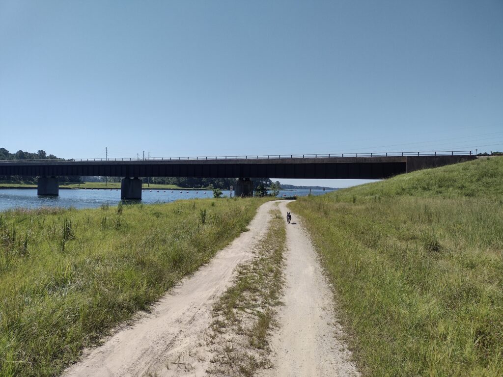 Heading to the shade under the rail trestle on the west side of the canal.