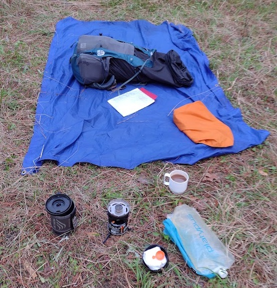 Breaking down my shelter and making breakfast